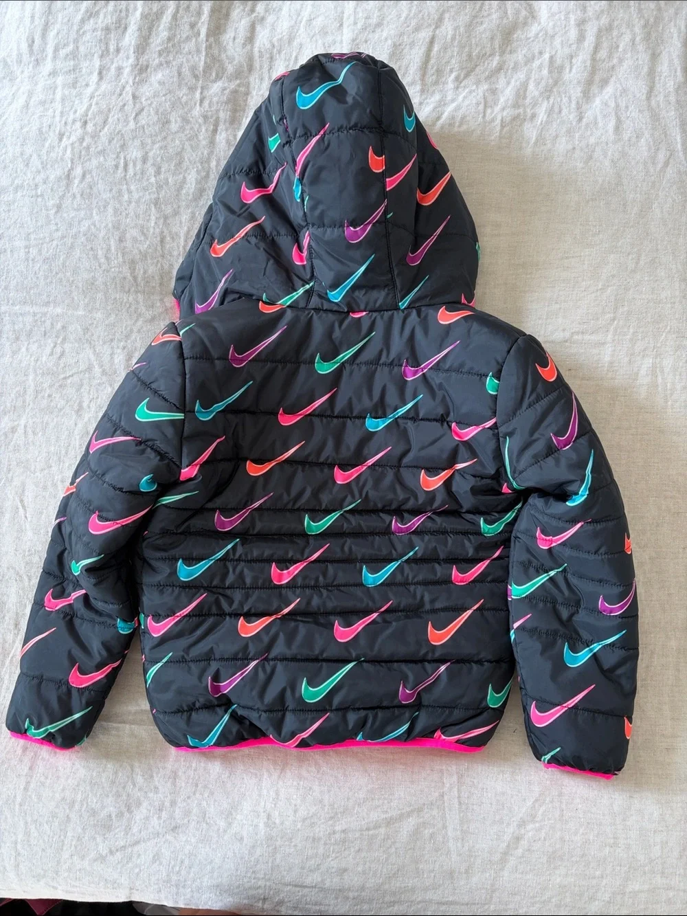 Nike Black Puffer Jacket with Multicolor Swooshes and Hot Pink Lining